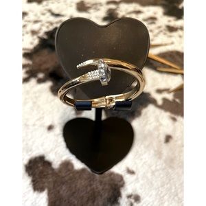 Nail bracelet with jeweled detail